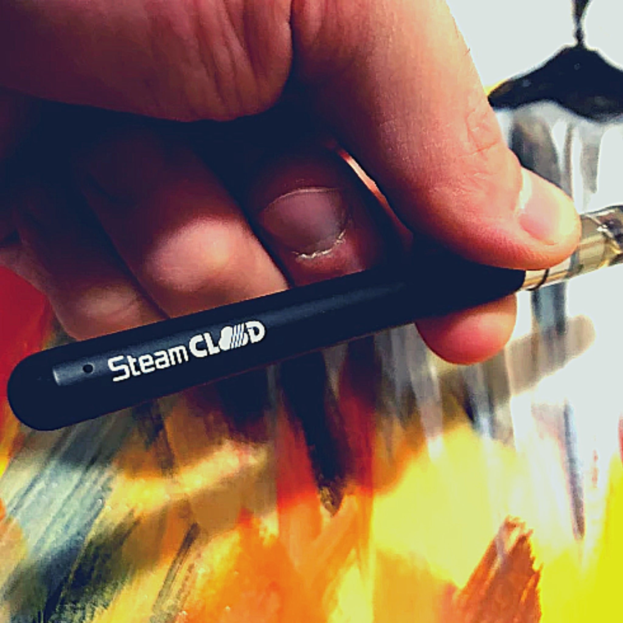 Hand holding SteamCloud oil vape pen 