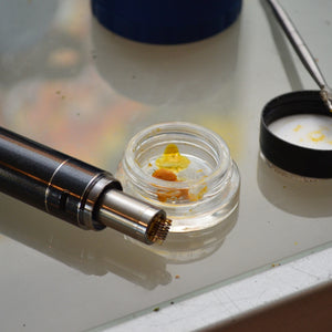 Wax pen with wax container